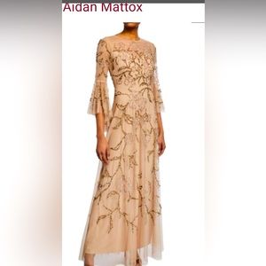 Formal MOB gown with a floral pattern with sequins.